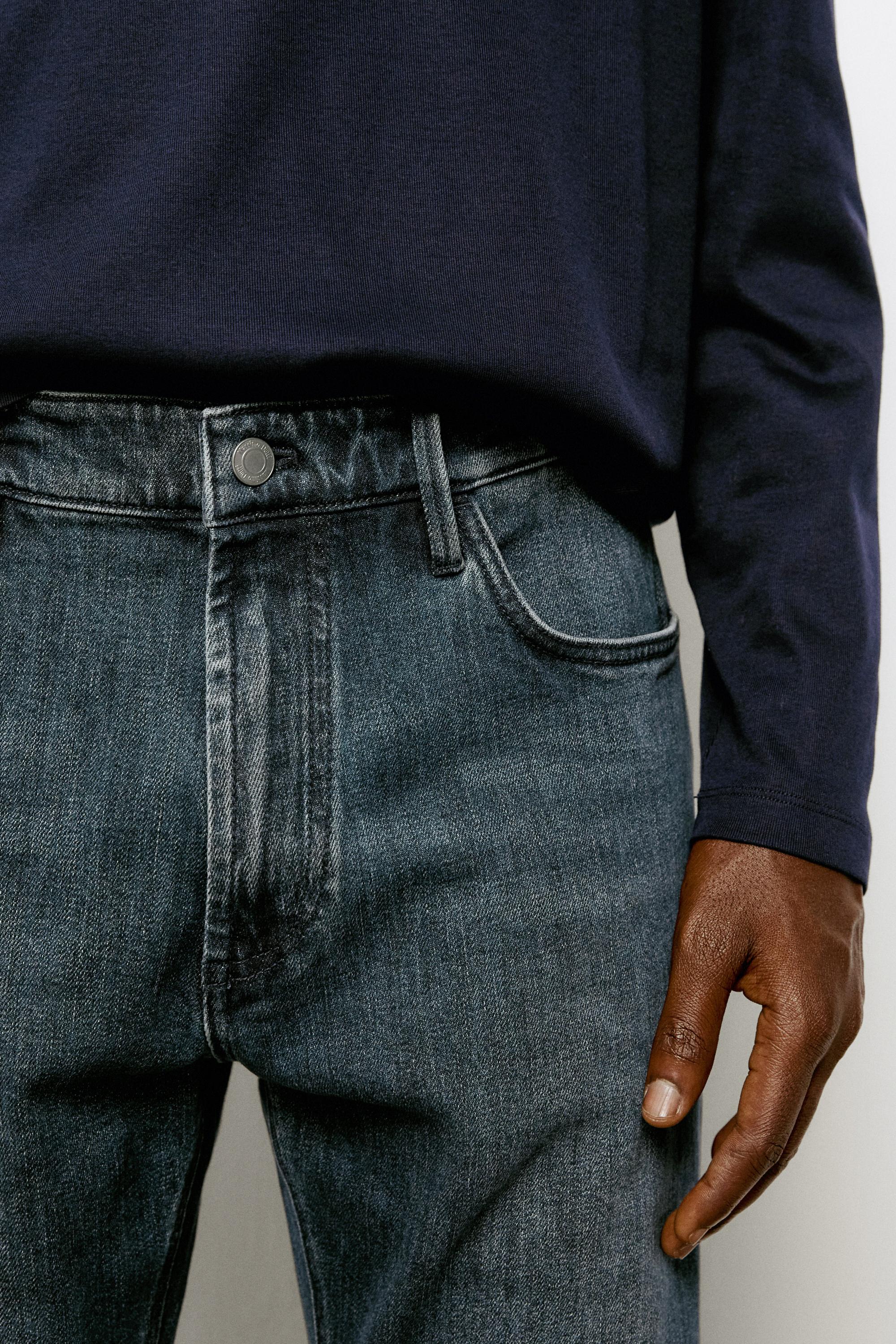 Enzymatic tapered fit jeans